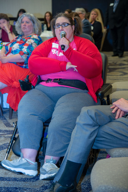 Self-advocate Alicia Hopkins provides feedback during the DRO priorities session