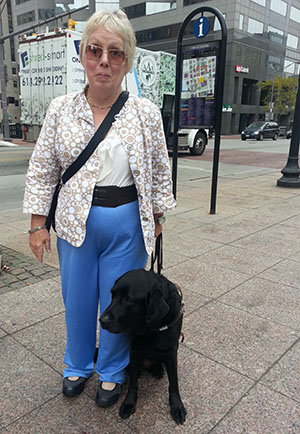 Disability Rights Ohio attorney Barb Corner and her service dog, Deluxe, participate in the Columbus Chapter of the American Council of the Blind of Ohio's White Cane Safety Day in Downtown Columbus.