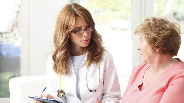 Doctor talking to patient